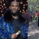 R. Kelly supporters play his music outside of the courthouse